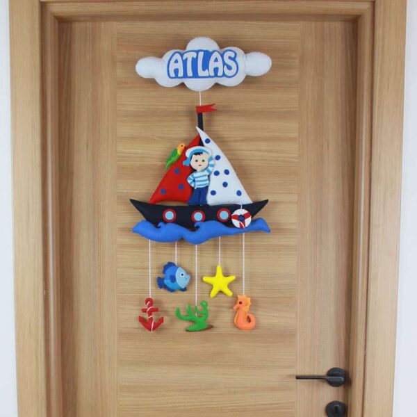 Atlas isimli kapı süsü keçe denizci