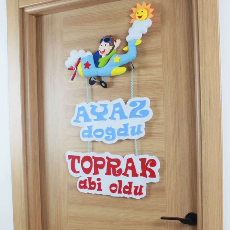 Ayaz ve Toprak isimli Kardeş Pilot Kapı Süsü