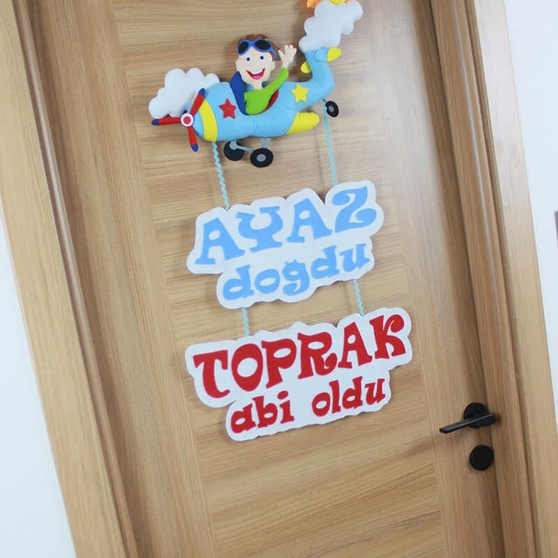 Ayaz ve Toprak isimli Kardeş Pilot Kapı Süsü