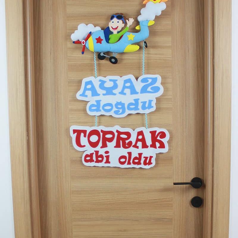 Ayaz ve Toprak isimli Kardeş Pilot Kapı Süsü