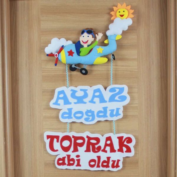 Ayaz ve Toprak isimli Kardeş Pilot Kapı Süsü