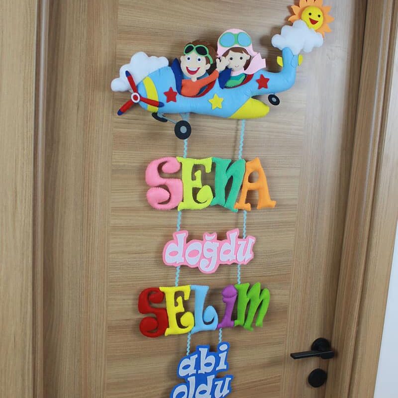 Sena ve Selim isimli Kardeş Pilot Kapı Süsü