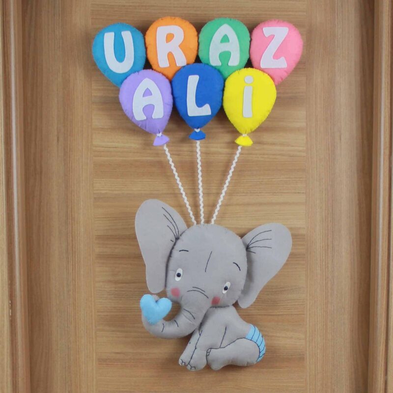 Uraz Ali isimli Filli Bebek Kapı Süsü