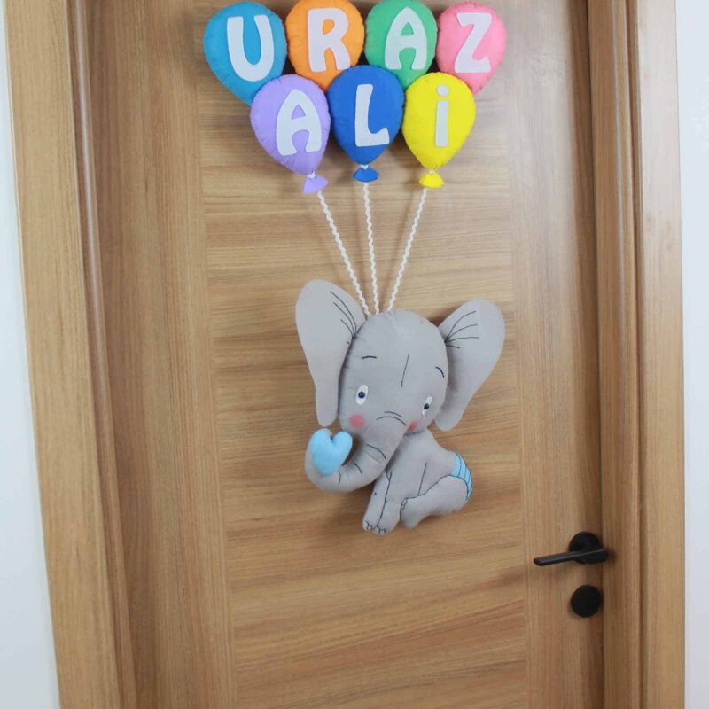 Uraz Ali isimli Filli Bebek Kapı Süsü