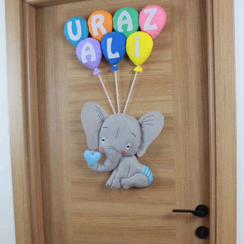 Uraz Ali isimli Filli Bebek Kapı Süsü