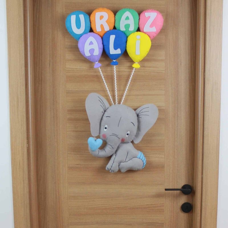 Uraz Ali isimli Filli Bebek Kapı Süsü