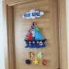 Yusuf Remzi isimli Denizci Bebek Kapı Süsü