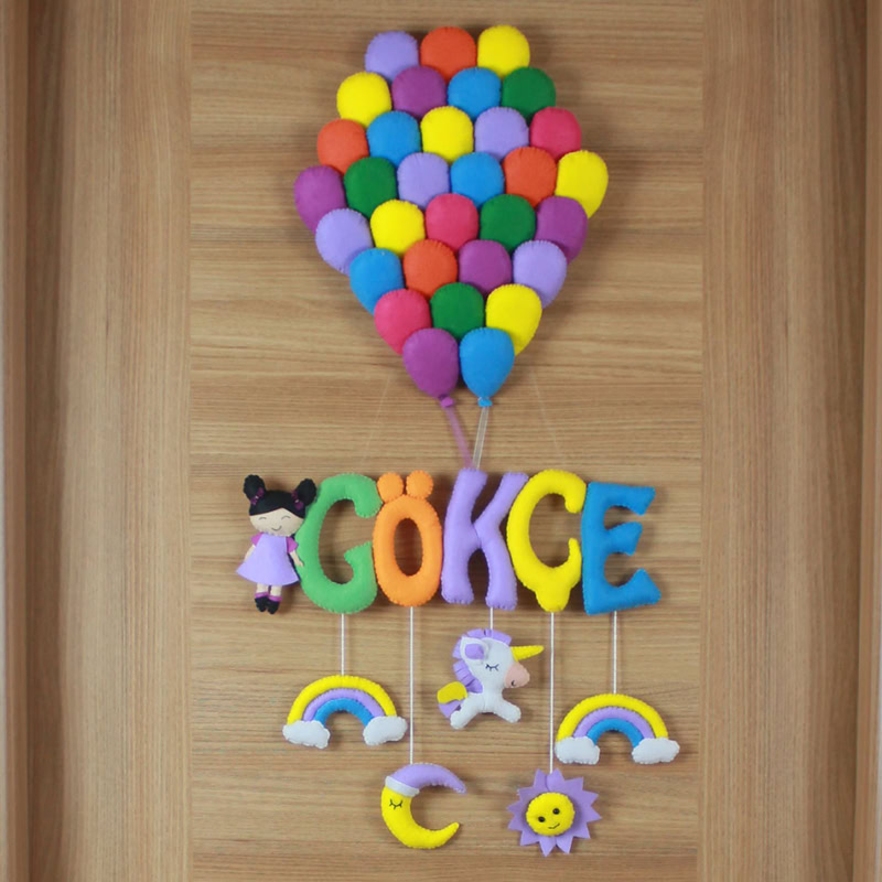 Yakın çekim: Rengarenk 3 boyutlu keçe balon buketi detayı