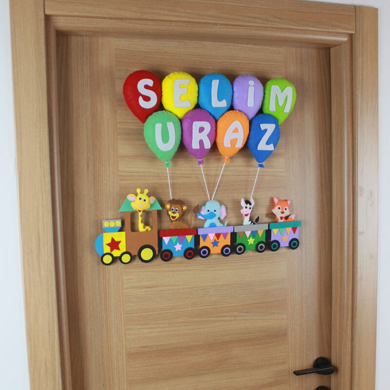 Bebek odası tren konsepti kapı süsü montaj ve dikey asılışı