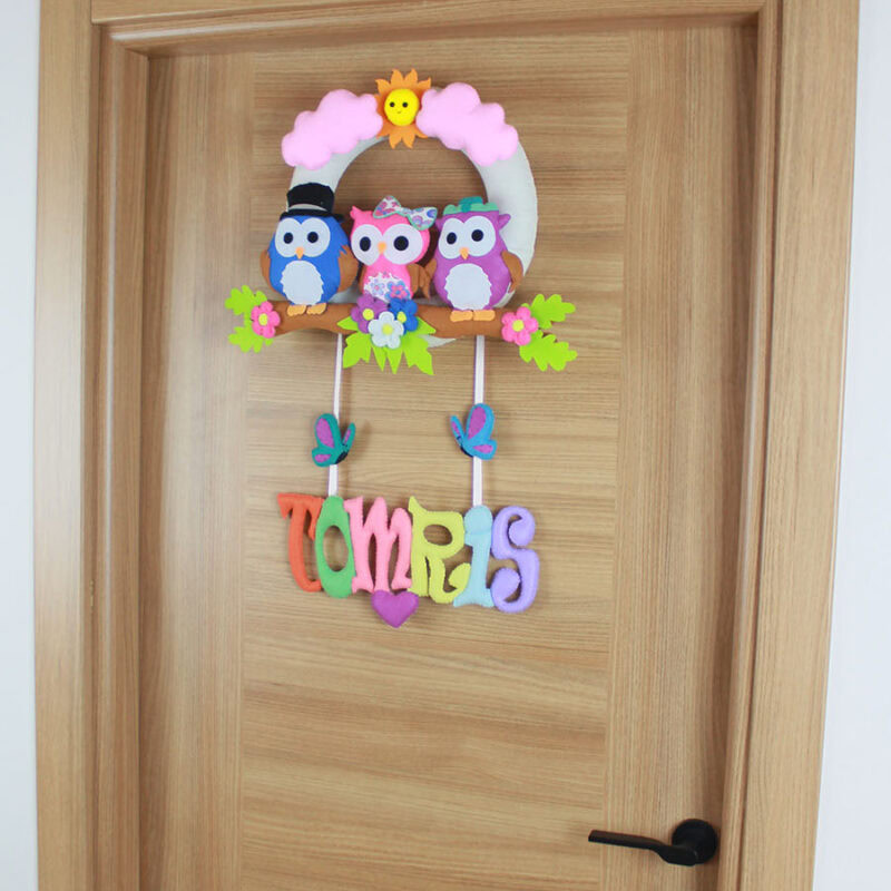 Kişiye özel Tomris yazılı keçe harfler ve kelebek detayları