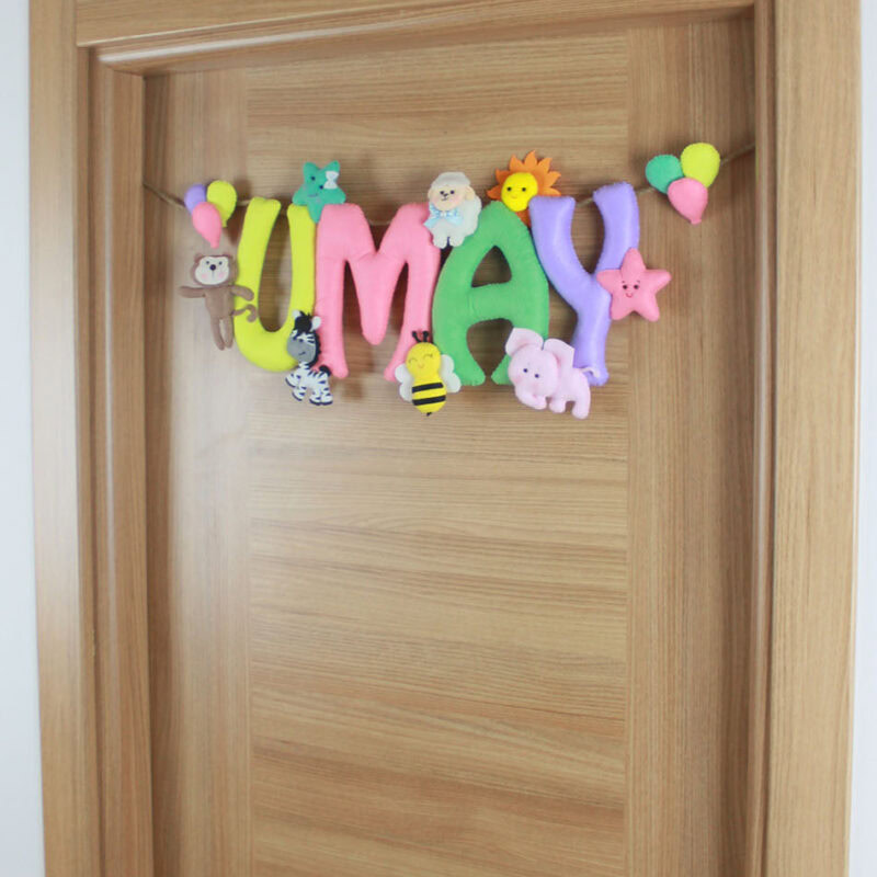 Arı, kuzu ve fil figürlü kişiselleştirilmiş kapı süsü detayı