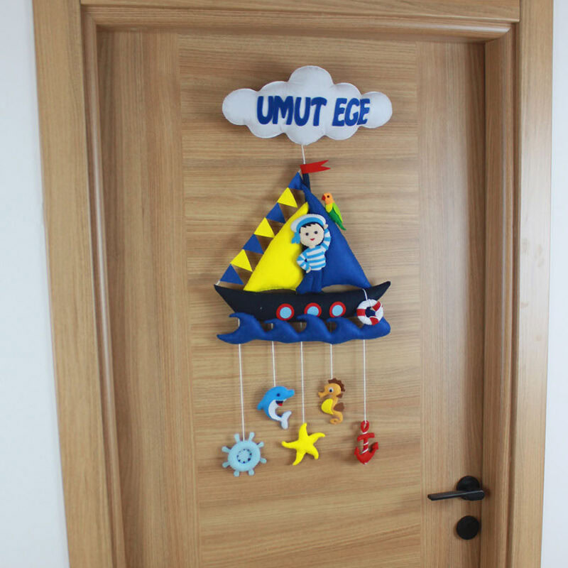 Keçe dümen ve çapa figürlü denizci kapı süsü detay çekimi