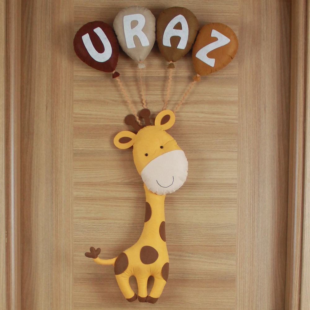 Uraz yazılı kahverengi ve krem tonlarında keçe balon detayları